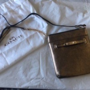 Coach gold and black metallic cross body purse